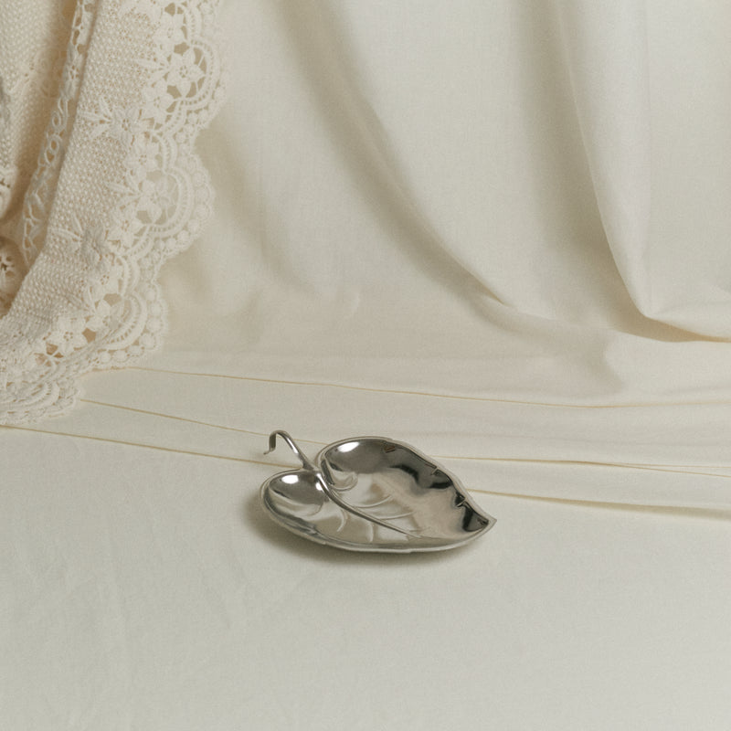 Vide-poche en métal chromé